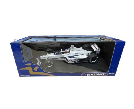 A boxed Minichamps 1/18 scale model: Williams Show Car, F1, Jensen Button