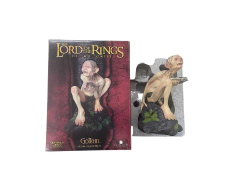 A boxed Sideshow/Weta Lord of the Rings polystone Gollum Figure. Number 3304/7500.