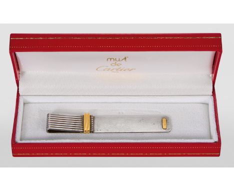 Cartier Lesezeichen-Must de Cartier "Collection Vendôme"Silberfarbenes Metall, partiell vergoldet, geriffelte Oberfläche. Num