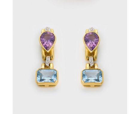 Paar Amethyst-Topas-OhrringeGelbgold, gest. 750. Schauseitig besetzt mit fliederfarbenen Amethysten und Skyblue Topasen. Ges.