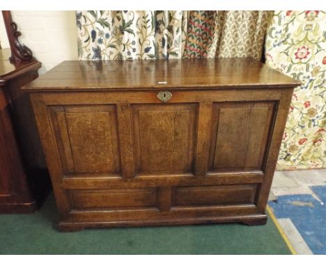 An Early Oak Three Panel Coffer Chest with Hinged Four Plank Lid and Dummy Drawer Panels to Base 126x63x89cm High 