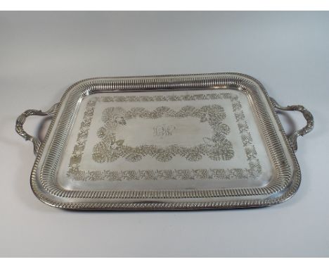 A Silver Plated Two Handled Butlers Tray by M and Co, Decorated with Ferns and Flowers to Centre Panel.  55.5 x 42cm Long