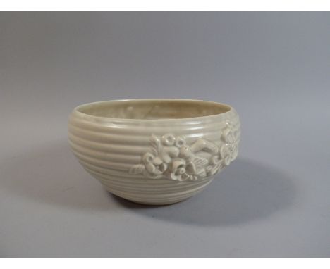 A Clarice Cliff Ribbed Bowl with Floral Decoration in Relief. 21cm Diameter.