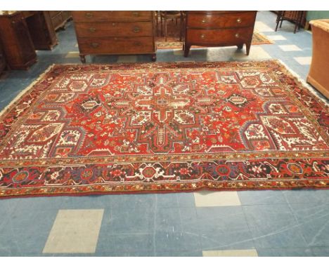 A Patterned Persian Carpet Square on Red Ground