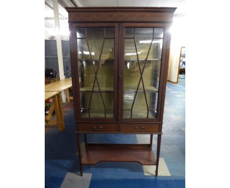 An Inlaid Edwardian Astragal Glazed Display Cabinet with Two Drawers and Stretcher Shelf. 91cm Wide.