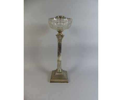 A Silver Plated Oil Lamp, the Square Stepped Base Leading to Reeded and Fluted Corinthian Column with Scrolling and Stylised 