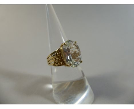 A 9ct Aquamarine Set Ladies Dress Ring. Stone 14x10mm. Total Weight 5.7gms. Size N