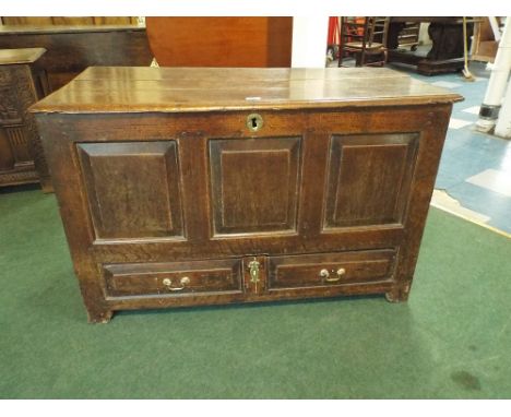 A Small Early Oak Three Panel Mule Chest with Two Base Drawers Having Hinged Lid and Peg Joints 111cms Wide