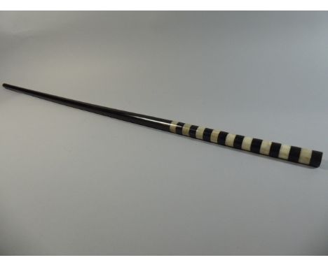 A 19th Century Walking Stick with Ebony Shaft and a Handle Made with Alternate Bands of Black and White