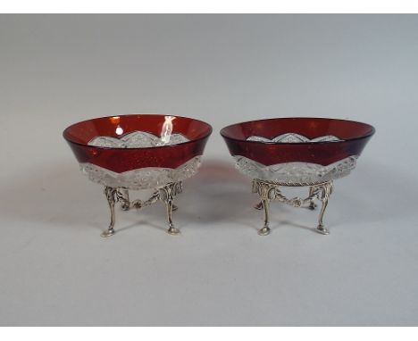 A Pair of Silver Based Ruby Flash Glass Bonbon Dishes. Silver Stands on Four Hoof Feet, Joined by Garlands with Centre Rose. 