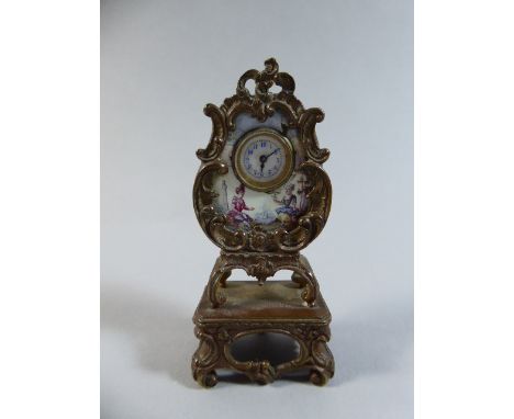 A 19th Century Miniature Ormolu and Porcelain Panel Clock in Rococo Form on Platform Base with Hand Painted Scene of Two Maid
