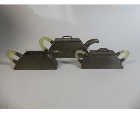 A Jade Handled Pewter Three Piece Miniature Tea Service By The Humphar Porcelain Co, Peking.