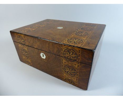 A 19th Century Walnut Work Box with Banded Inlay having Geometric Pattern and Mother of Pearl Hexagonal Escutcheons. Removabl