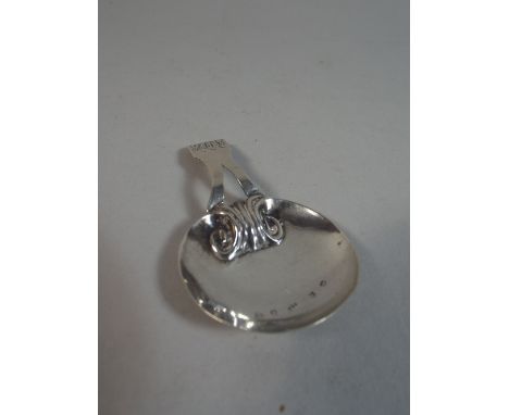 A Georgian Silver Tea Caddy Spoon.  Split Handle to Bowl with Scrolling Decoration,