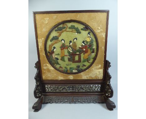 A 19th Century Japanese Circular Green Stone Shibayama Table Screen on Finely Worked Hardwood Pierced Stand.  Decorated with 