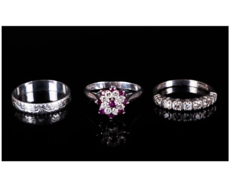 Two Ladies 18ct White Gold Diamond Rings, 7 Stone Diamond Half Eternity And A Ruby And Diamond Cluster Ring, Together With A 