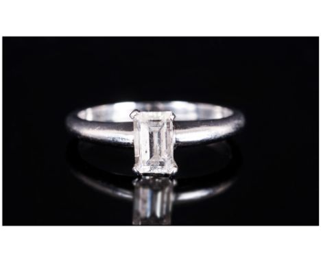 Platinum Single Stone Diamond Ring Set With An Emerald Cut Diamond, 4 Claw Setting Accompanied With An AGI Diamond Report Sta