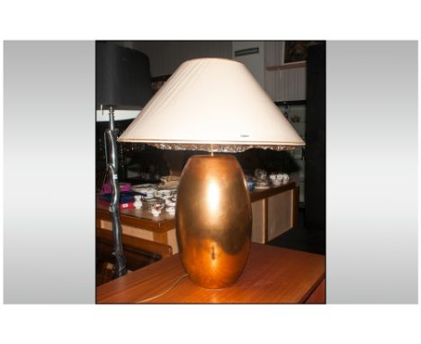 Modern Design Table Lamp Gold tone base with cream shade. 30'' in height. 