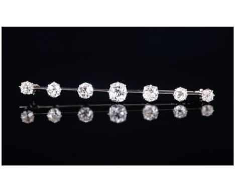Antique Ladies - 18ct White Gold Set 7 Stone Diamond Bar Brooch. The Cushion Cut Diamonds of Excellent Colour - G-H. The Cent