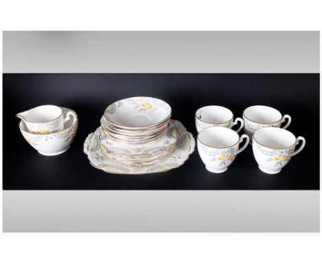 Melba Bone China Part Tea Set comprising cups, saucers, side plates, milk jugs, sugar bowl. 20 pieces in total