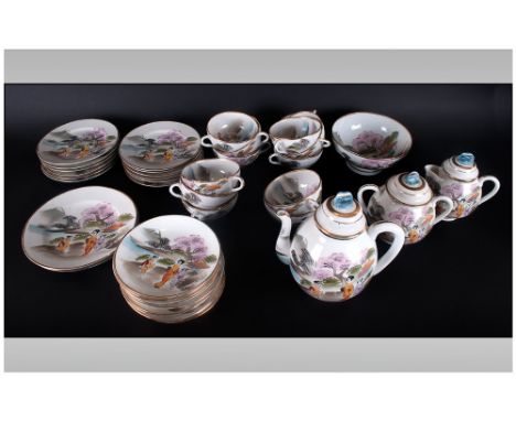 42 Piece Japanese Eggshell Porcelain Tea Set Decorated with Geisha In A Garden Setting with flower finials to the lids. C1920