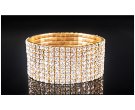 White Crystal Eight Row Bracelet, a classic bangle style stretch bracelet of good quality round cut white crystals, prong set