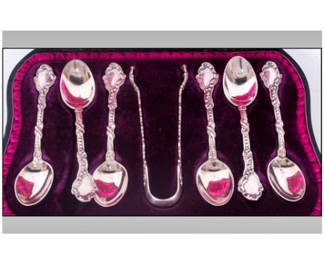 A Good Boxed Set of Six Ornate Silver Tea Spoons and Matching Pair of Sugar Nibs. Marked Sterling Silver with Birmingham Impo