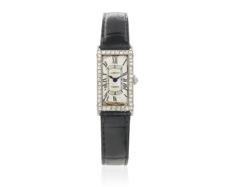 Cartier. A platinum diamond set manual wind wristwatchDate: Circa 1930Movement: 18-jewel manual windDial: Silvered, black Rom