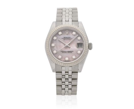 Rolex. A lady's stainless steel and 18K white gold automatic diamond set calendar bracelet watch with mother of pearl dialMod