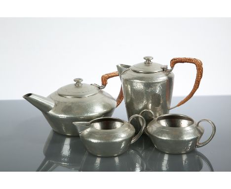 LIBERTY'S PEWTER TUDRIC FOUR PIECE TEA SERVICE 
comprising a teapot, hot water pot, sugar and cream, of squat circular form a
