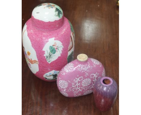 CHINESE GINGER JAR with pink ground; along with an ivory lidded bottle and a red/purple glazed vase, the ginger jar 24cm high