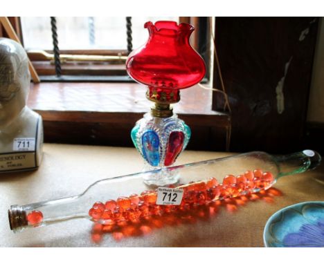 Victorian glass rolling pin and small oil lamp