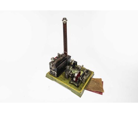 with horizontal boiler and brick effect stand, single fixed cylinder engine with governor connected to simple electric dynamo