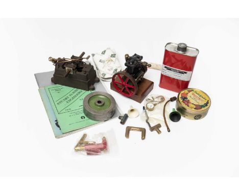 similar to a Stuart Sirius engine, mounted on wooden block; together with the chassis of another engine, catalogues and other