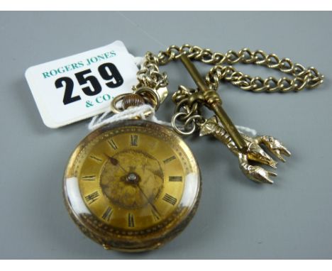 A lady's eighteen carat gold encased fob watch, the case chased in scrolls and flowers and with a white metal Albert chain an