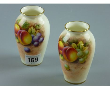Royal Worcester 'Fallen Fruit' vases - two hand painted vases with gilt rims, signed 'Roberts', black Worcester backstamp num