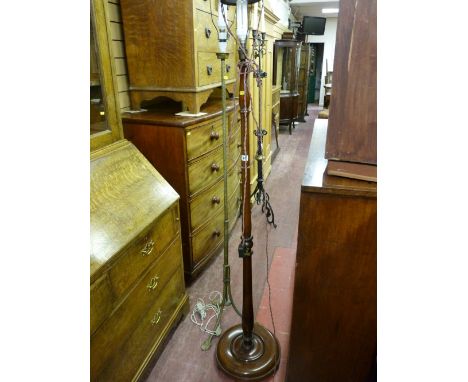 An early 20th Century mahogany standard lamp and shade and a vintage brass standard lamp and shade