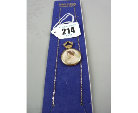A nine carat gold framed photo pendant and a nine carat gold fine neck chain