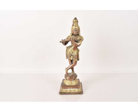 A late 19th Century/early 20th Century Bronze Krishna, the standing figure playing the flute, 23cm Hsome light surface scratc