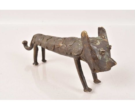 An Ashanti Bronze Animal Figure, possibly a Leopard, having stylised spots down the torso, 16.5cm long