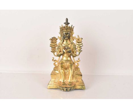 A Sino-Tibetan gilt bronze of Buddha, seated on a Throne, flanked by Dhvaja, 22cm Hsome wear to the gilt, light surface scrat