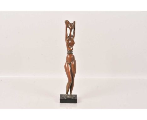 A Female Bronze by Soukop, having elongated neck and disproportional body, on fitted wooden base, with sculptor name to the b