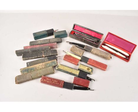 An assortment of Vintage Cut Throat Razors, to include Wells Hollow Ground, Lurham Luplex, Wylie Hollow Ground, Bengall, Thom