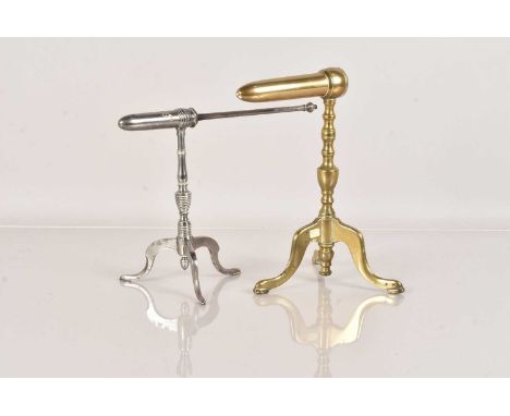 A small plated Goffering Iron, having tripod base, with original poker, together with a larger brass example, of similar desi