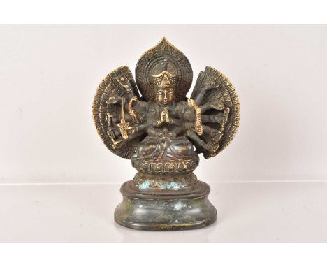 A Bronze figure of a Avalokiteshvara Buddha, having a covered base, approx. 13cm Hone very small piece broken, old break, gil