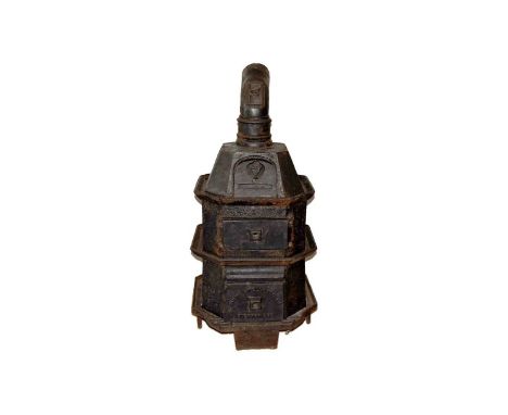 A vintage Three Tier Iron Stove by Smith & Wellstood, in various sections, approximately 102cm H and 47cm W at base