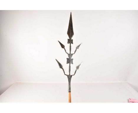 An Unusual African Tribal Spear, having spearhead to the top, with four smaller branches, with barbed arms, on later pole, he