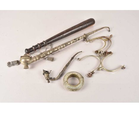 A Middle Eastern White Metal Opium Pipe, together with s smaller example, plus a Middle Eastern Bracelet/Bangle, two pairs of