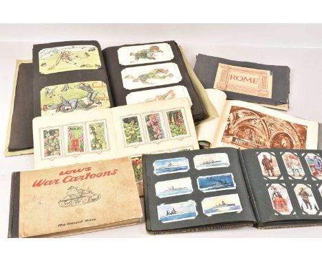 A postcard album containing Italian Postcards, plus a selection of Comical Military Cards, together with a selection of cigar