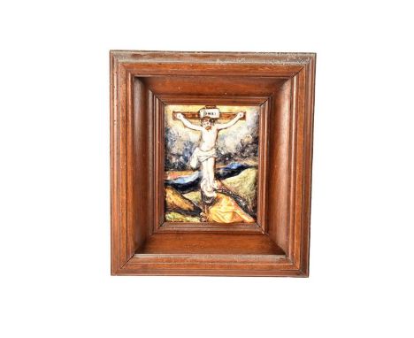 A small Maiolica Crucifixion Plaque, depicting Jesus on the Cross with Mary Magdalene at his feet, having artist initial to t